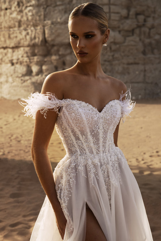A-line wedding dress with feathered straps
