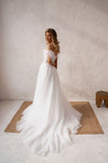 A-line wedding dress with feathers