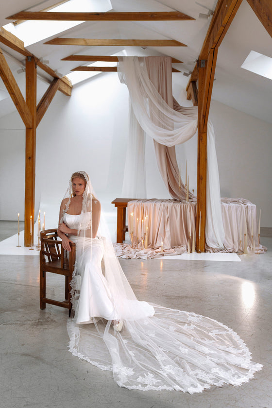 Draped waist satin wedding dress