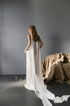 Fitted bridal dress with draped waistline