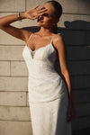 Fitted wedding dress with draped waist