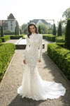 Lace mermaid bridal gown with V-neckline