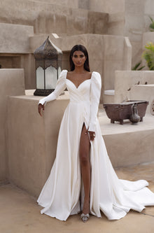  Long sleeve wedding dress with subtleslit