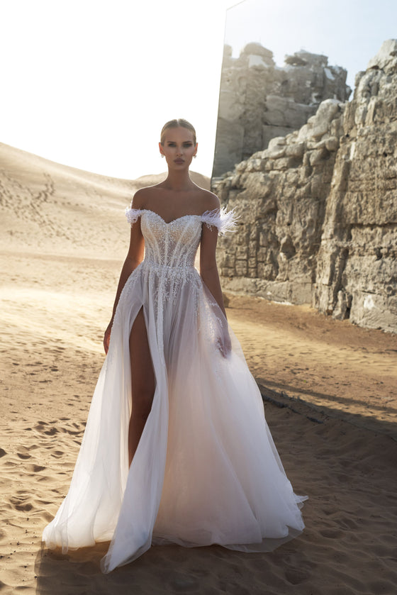 Tulle and lace bridal gown with slit