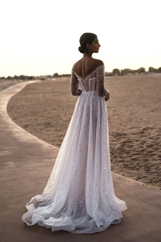 Tulle wedding dress with long sleeves