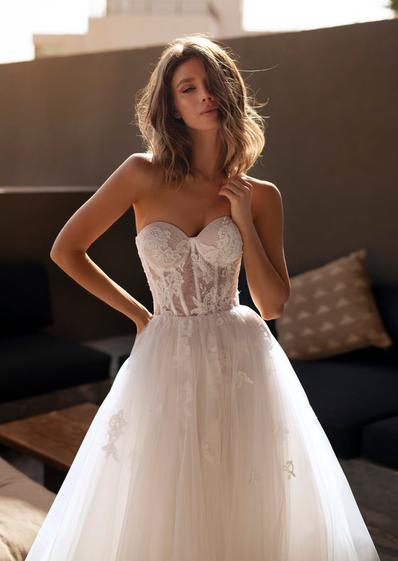 a line wedding dress with sweetheart neckline