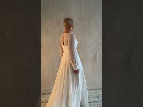 Elegant A-Line Wedding Dress with Long Sleeves and Deep Slit