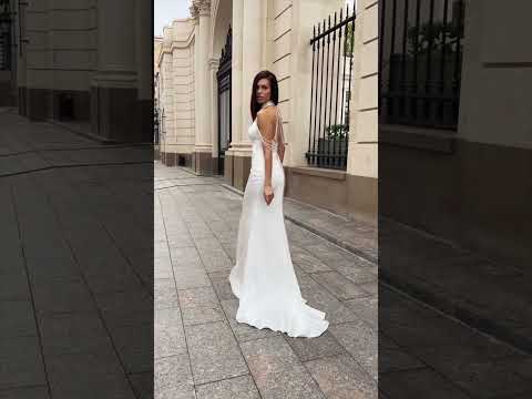 Elegant High Neck Satin Wedding Dress with Intricate Beaded Detailing