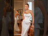 Get ready to stun in this form-fitting wedding gown
