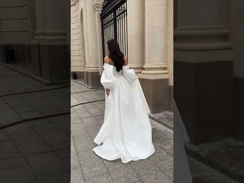 Elegant Long-Sleeved Organza Wedding Dress with Bows and Slit