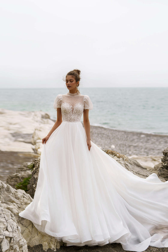 Elegant A-Line Wedding Dress with Closed Shoulders and Beaded Details Wedding Roof Elegant A-Line Wedding Dress with Closed Shoulders and Beaded Details Wedding Roof