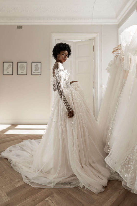 Elegant Long Sleeve Ball Gown Wedding Dress with Plumage Embellishment Wedding Roof Elegant Long Sleeve Ball Gown Wedding Dress with Plumage Embellishment Wedding Roof