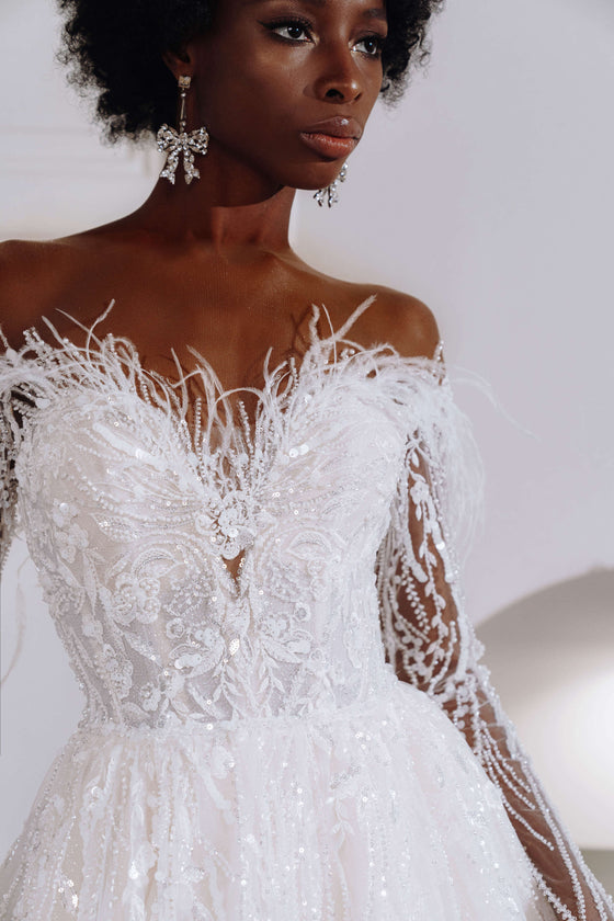 Wedding Dress With Feathers On Bottom Elegant Long Sleeve Ball Gown Wedding Dress With Plumage Embellishment Wedding Dress With Feathers On Bottom Elegant Long Sleeve Ball Gown Wedding Dress With Plumage Embellishment